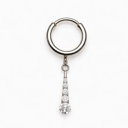 Argola de titânio com pendente de zircónias 